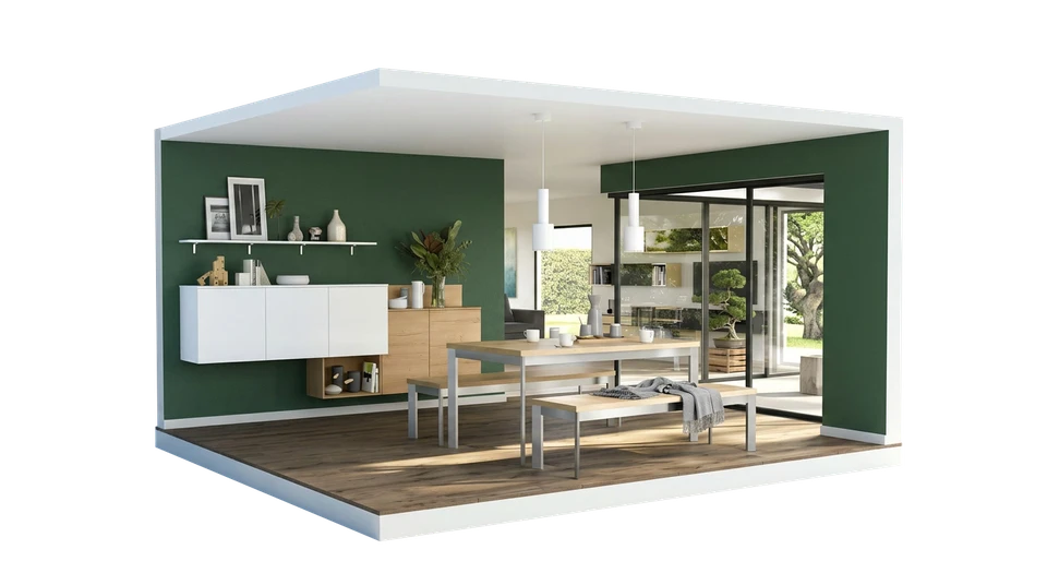 Réunion de travail en intérieur avec deux personnes analysant des plans architecturaux sur table